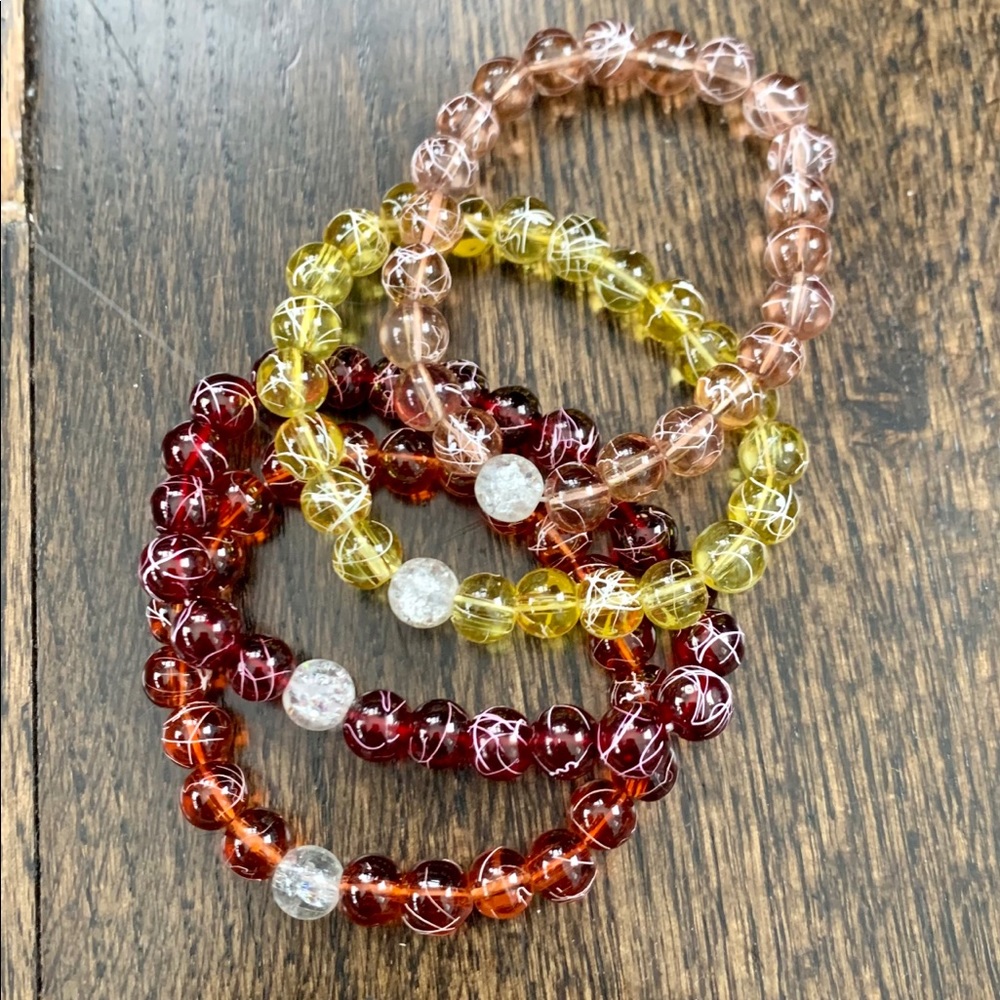 Four Beaded Bracelets - image 1